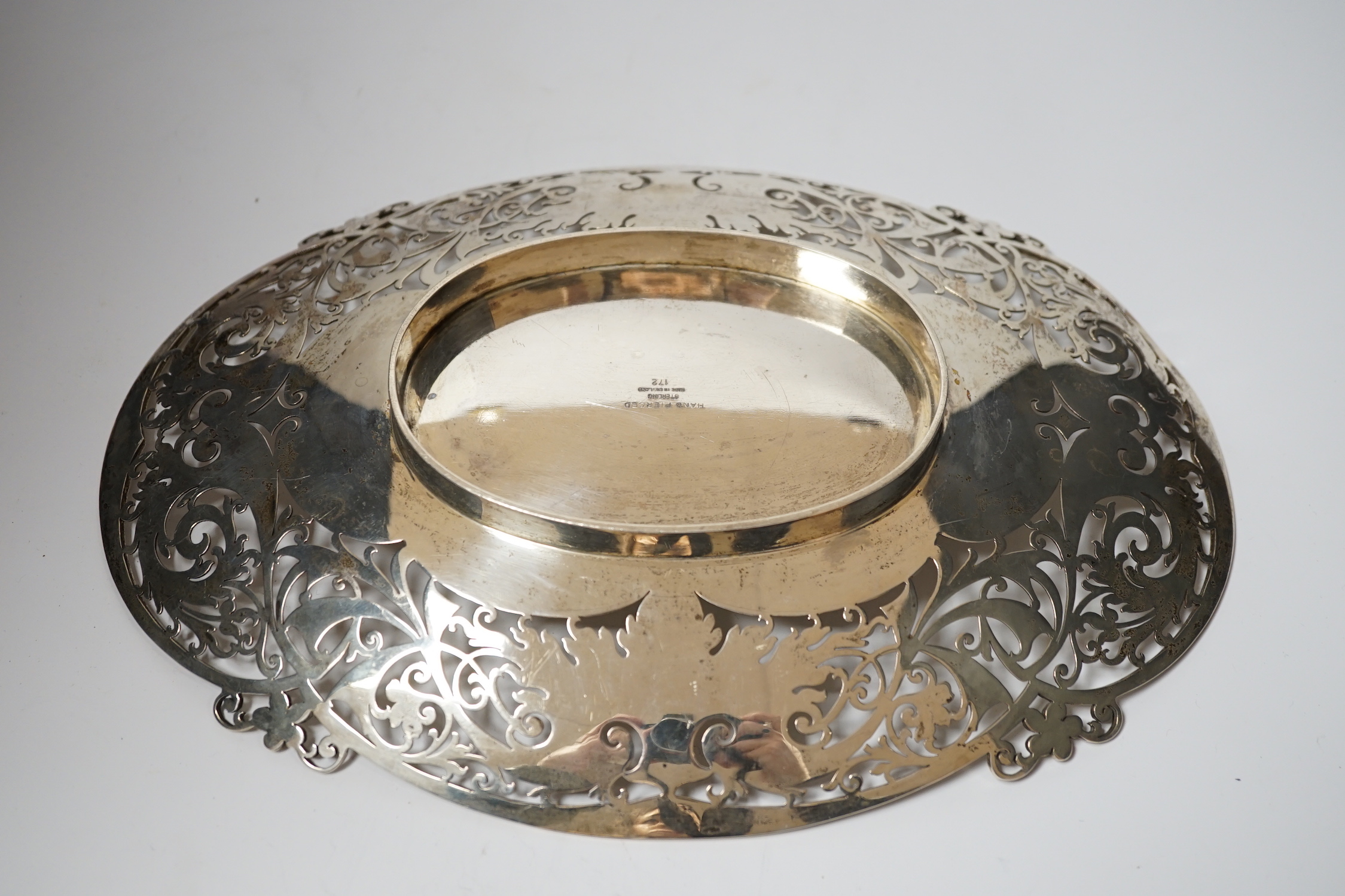 An Elizabeth II pierced silver shallow dish by Viners Ltd, Sheffield, 1955, 29.6cm, 16.9oz.